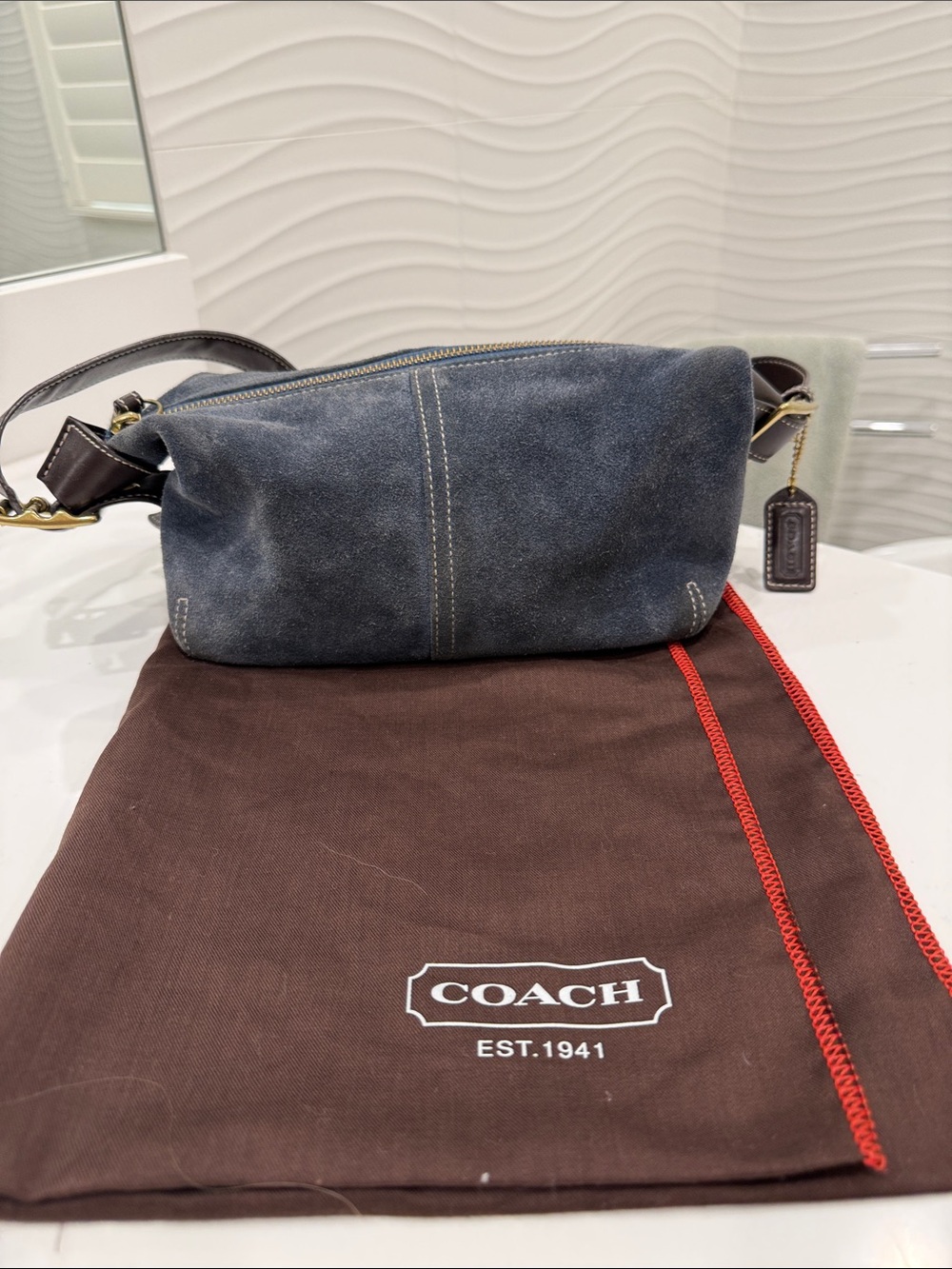 Coach women’s Blue Suede Bag with Brown leather Strap
